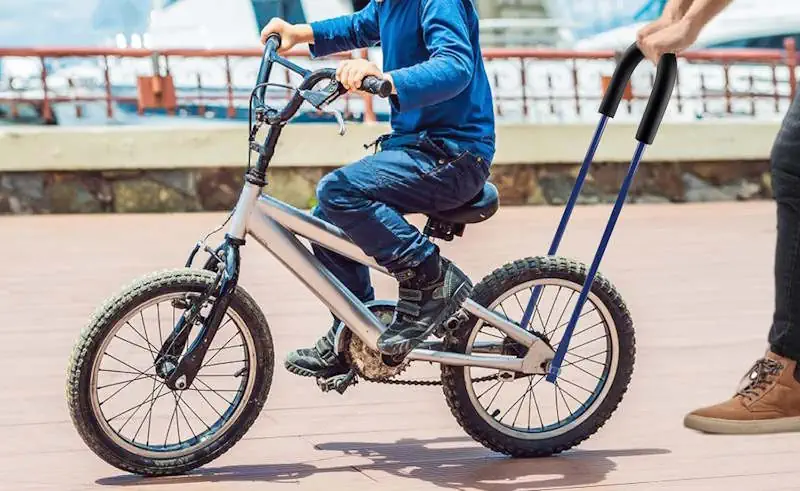 BARRA APRENDIZAJE BICICLETA PARA ENSEÑAR A PEDALEAR. COMPARA LAS MEJORES